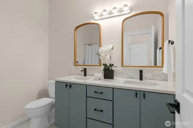 Primary bath with double sinks.