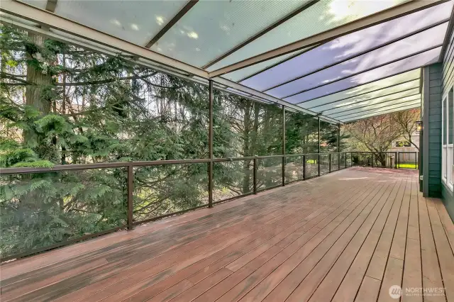 An abundance of space on this expansive covered back deck, perfect for accommodating all your outdoor living furniture and creating the ultimate entertainment or relaxation spot.