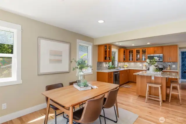 Open-concept living at its best connect with guests from kitchen to dining with ease and elegance.
