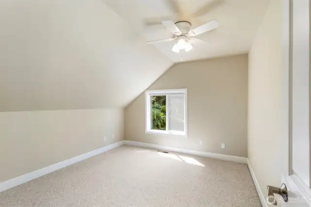 Another spacious upper-level bedroom.