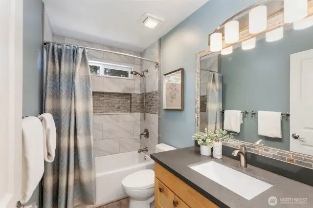 Crisp and bright upstairs full bath.