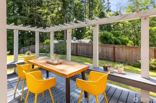 Dine al fresco or gather with friends on this sunny deck, complete with built-in seating and PNW views.