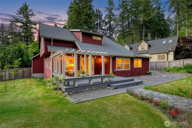 Enjoy serene sunset views from the expansive backyard, ideal for gatherings or quiet evenings under the stars.