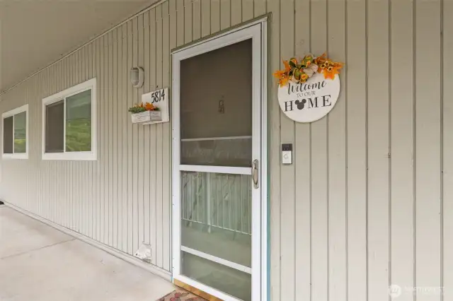 Exterior entrance into this top floor unit.