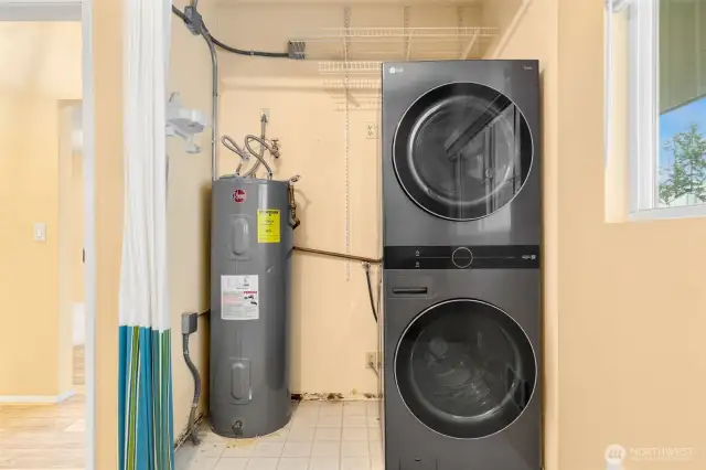 Washer/dryer in closet of second bedroom.