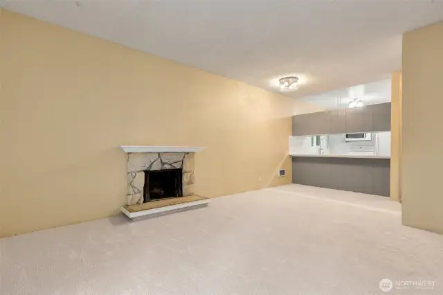 Living area and dining unstaged.