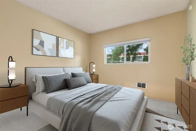 Primary bedroom is big enough for a king sized bed. (virtually staged)