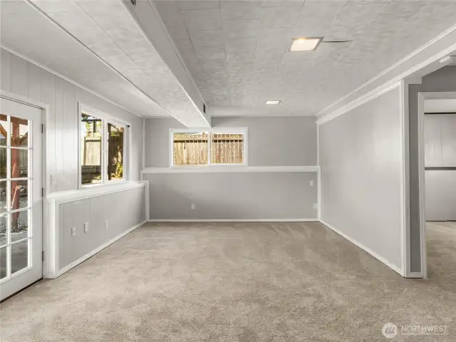 downstairs flex space could be used for relaxing or multi-generational living. Room for a 3rd bathroom in laundry room space