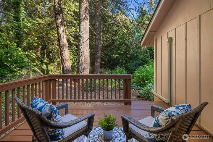Gorgeous backyard deck overlooking lush private backyard.