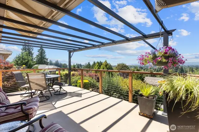 Pergola covered wrap around deck to capture the beautiful views!