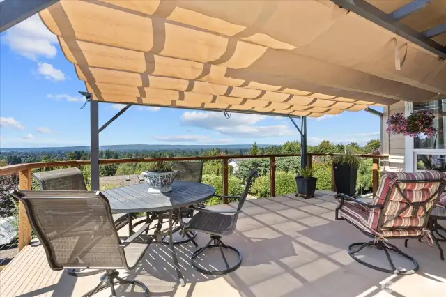 Retractable awning...aslo has pull down shades that drop down in front.