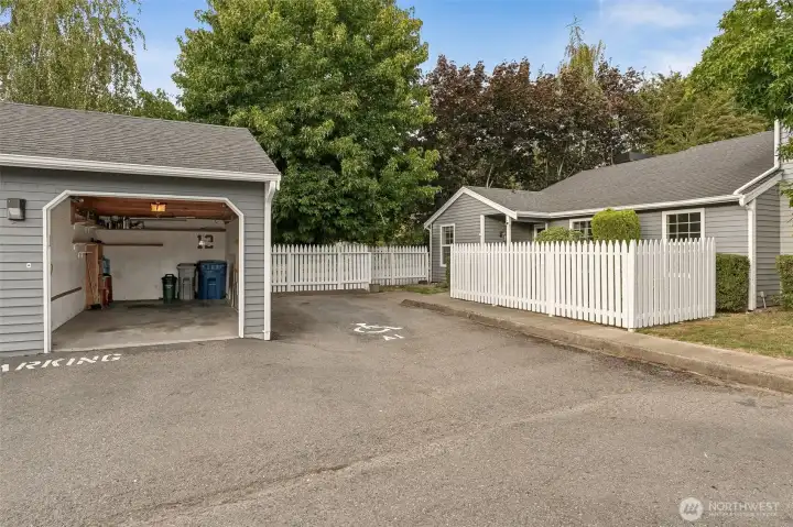 property includes a garage space and one additional space right next to the unit.