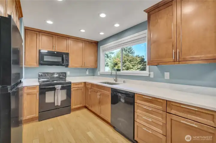 Updated kitchen with gorgeous new countertops.