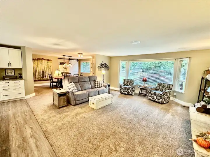 Open design offers large great room.  Big windows let in plenty of light.