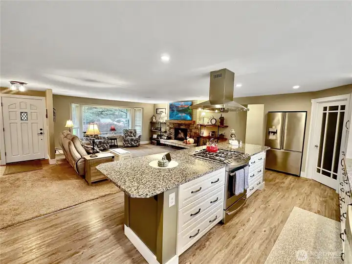 Dual fuel range offers gas burners and convection oven.