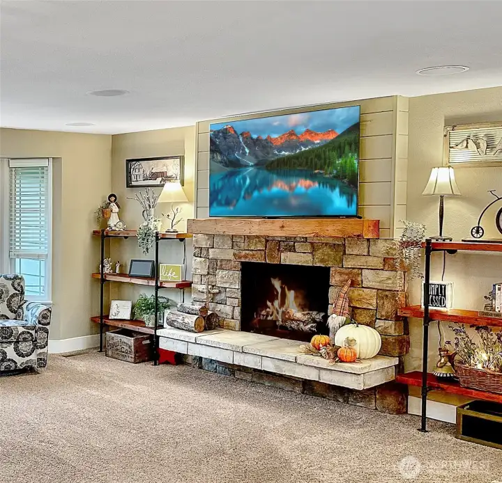 Close up of fireplace and built in shelving.