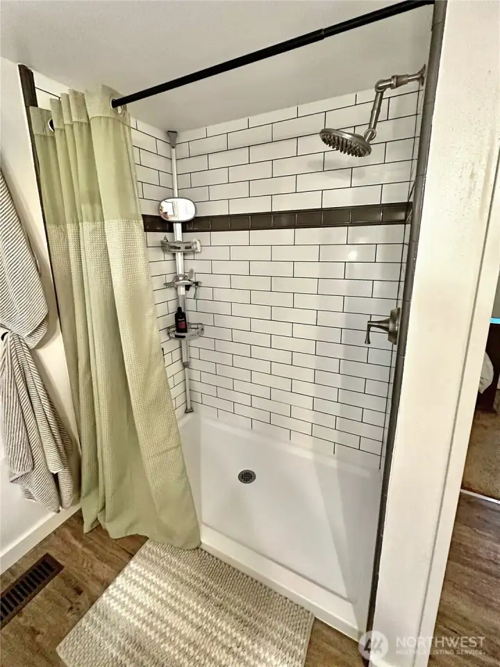 Stunning tile shower.