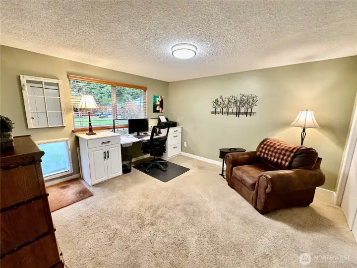 Large 3rd bedroom with built in desk.