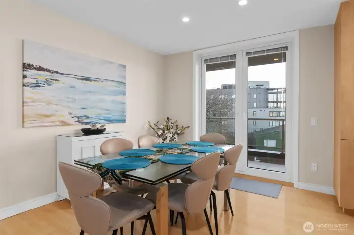 Here is another photo of the dining area and the side deck adjacent to the kitchen.