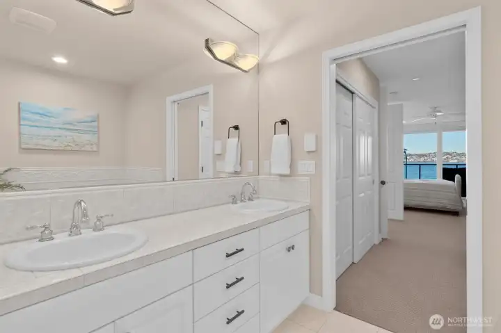 Primary bath looking into the Primary bedroom (walk-in closet to the right not shown here).