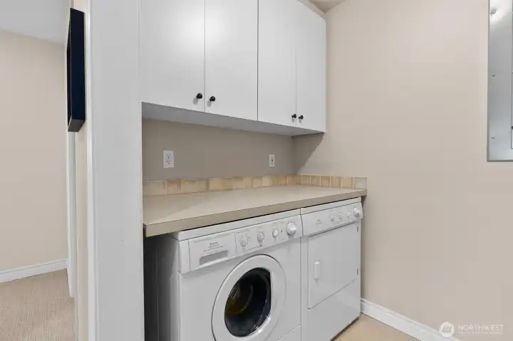 The laundry room has a wash-sink that is not shown, just to the right.