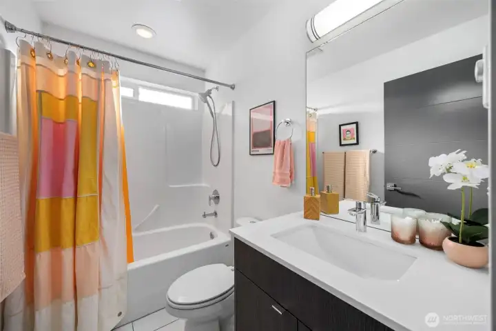 A full guest bathroom on the third level.