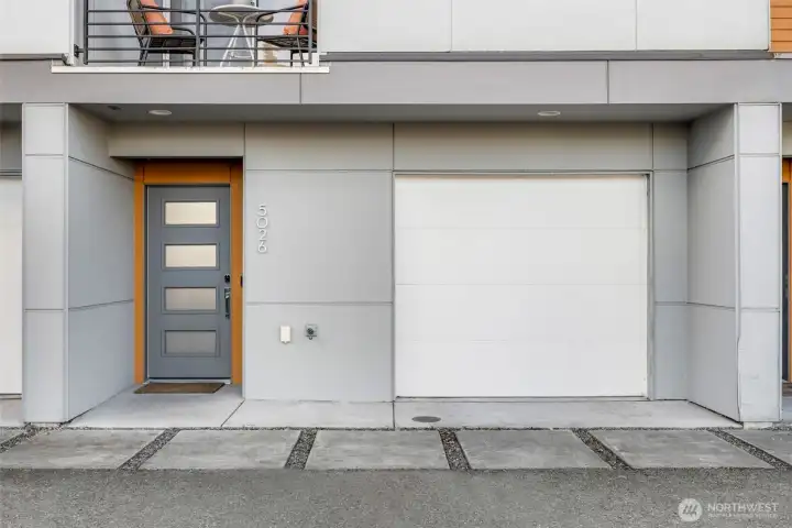 An attached garage provides easy access and added functionality.