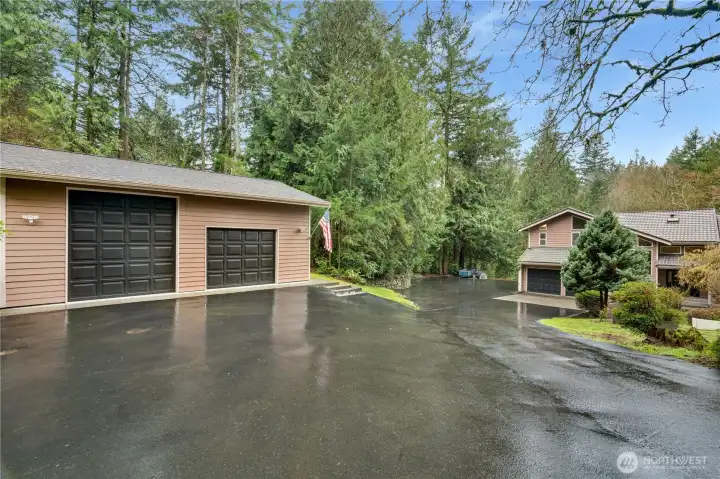 Bring the boat, trailer, and weekend projects—this property delivers a huge shop/RV bay, extra garage storage, and a long private drive that keeps everything tucked away from the street.