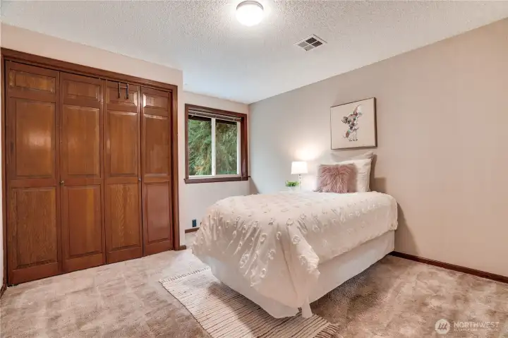 One of three additional upstairs bedrooms.
