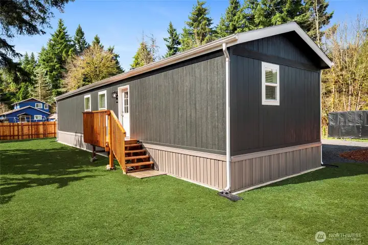 BACK OF HOME  Grass virtually edited.