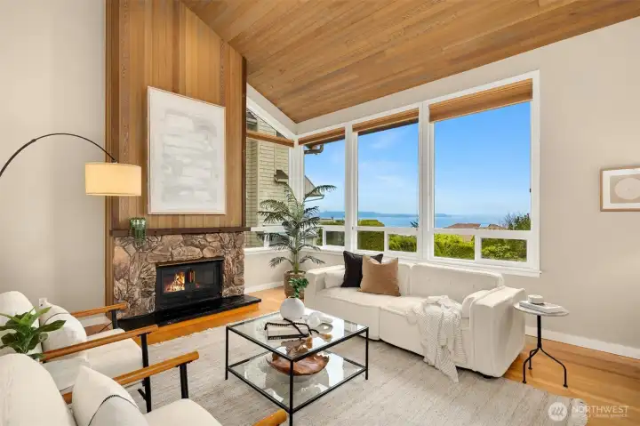 Warm and inviting living room space looking out to the lake view.