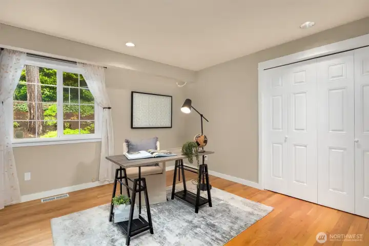 3rd bedroom or office looks out to the peaceful backyard.
