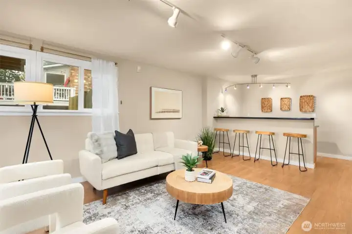 Lower-level rec room with wet bar—perfect for entertaining!