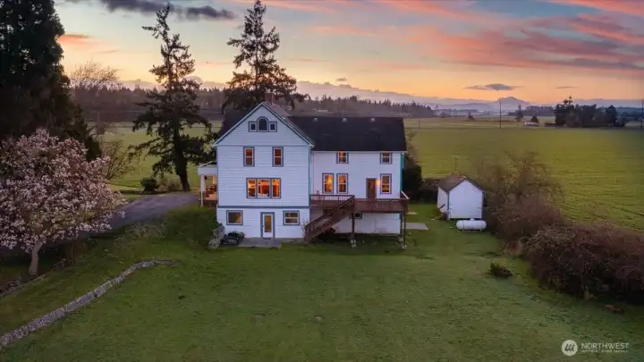 Experience the ownership of a true 1890 landmark. Held by only four owners in its 136-year history, this Stanwood treasure is on the market for the first time in over two decades. Tucked at the end of a 1,600-foot private drive, it offers absolute seclusion and breathtaking sunrises. Here, you have the peace of a historic waterfront sanctuary while being just minutes from downtown shopping and I-5. A once-in-a-generation legacy property ready for its next chapter.