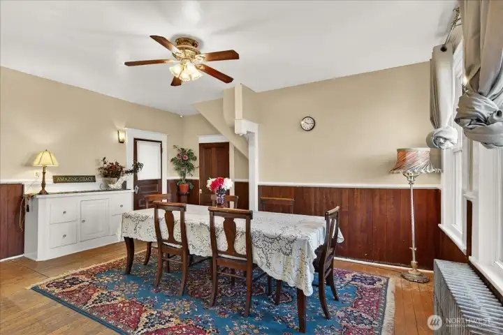 This dining room has such a solid, classic feel. The windows look right out over the private backyard, giving you great views and total privacy while you eat. With the original wood wainscoting, it’s a warm, welcoming space that’s perfect for entertaining.