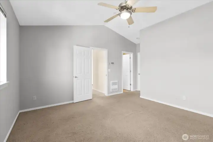 Another view of the primary bedroom.