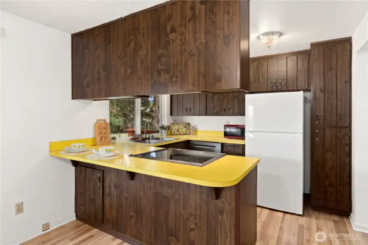 Retro kitchen filled with love.  Very well maintained and cleaned for many years.