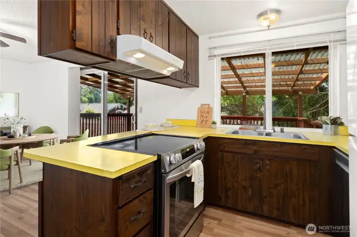 Practical kitchen. Cabinets are all in great shape. Dining room is virtually staged
