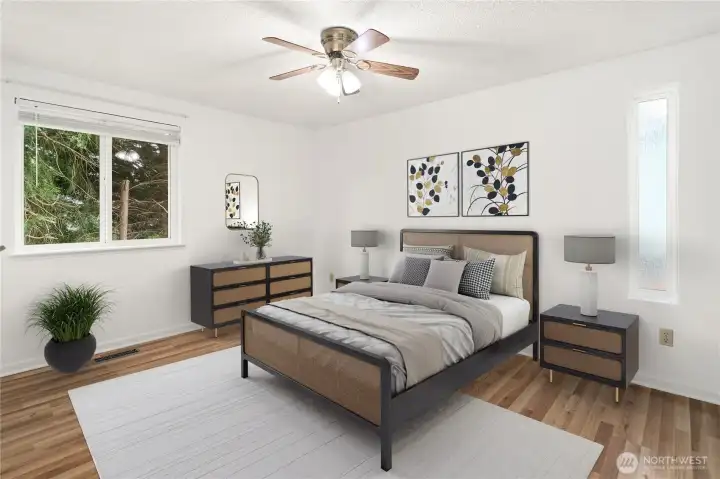Primary bedroom located in the end of the hallway. Noticed: one skinny window on the left side of the bed is erased...  virtually staged