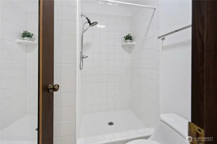 shower and toilet in separated by the door for the privacy