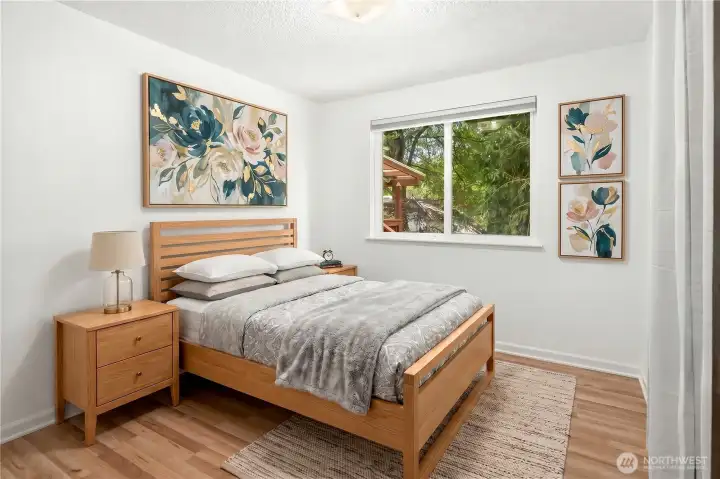 Second bedroom of 3. window facing towards the barkyard Virtually staged