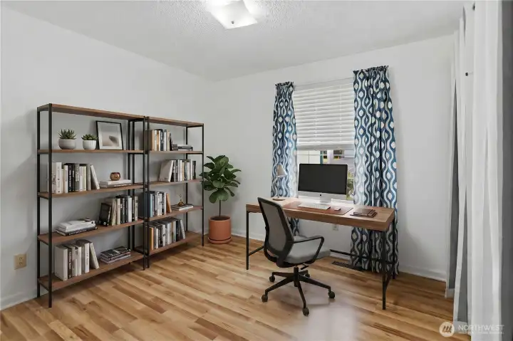 3rd bedroom facing in front with virtually staged