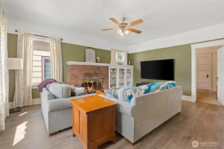 wood burning fireplace, and charming glass front built-in!