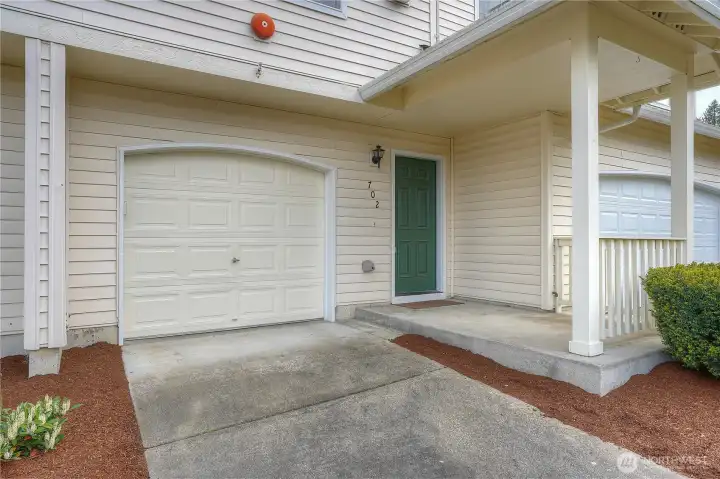 Includes a one-car garage plus an additional driveway parking space for added convenience.