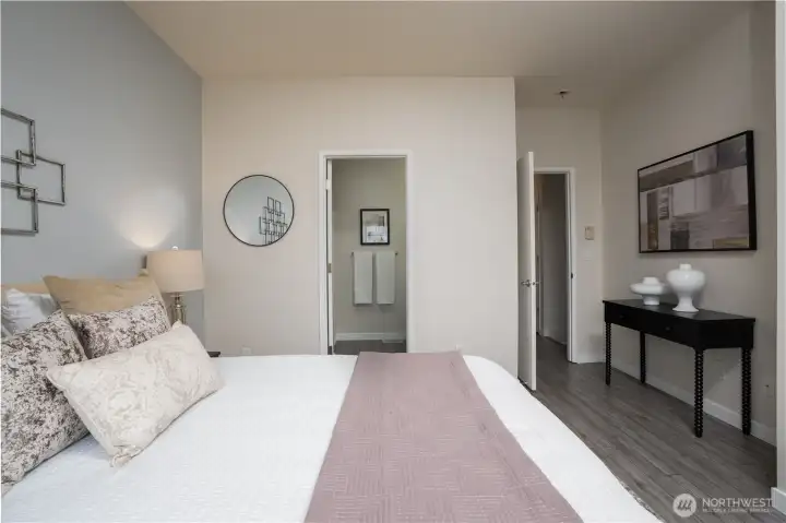 The primary bedroom features an en-suite primary bathroom, creating a private and comfortable retreat for everyday living.