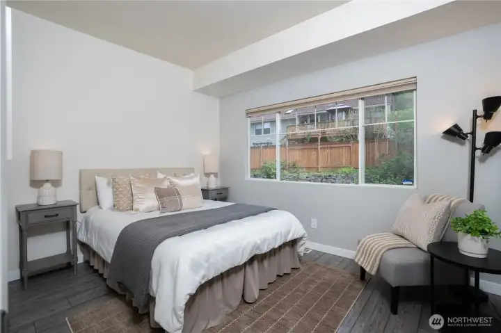 The second bedroom offers a versatile space ideal for guests, a home office, or additional living needs.