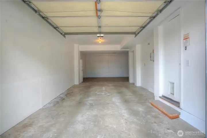 Oversized tandem garage offers flexible space for parking, storage or a home gym.