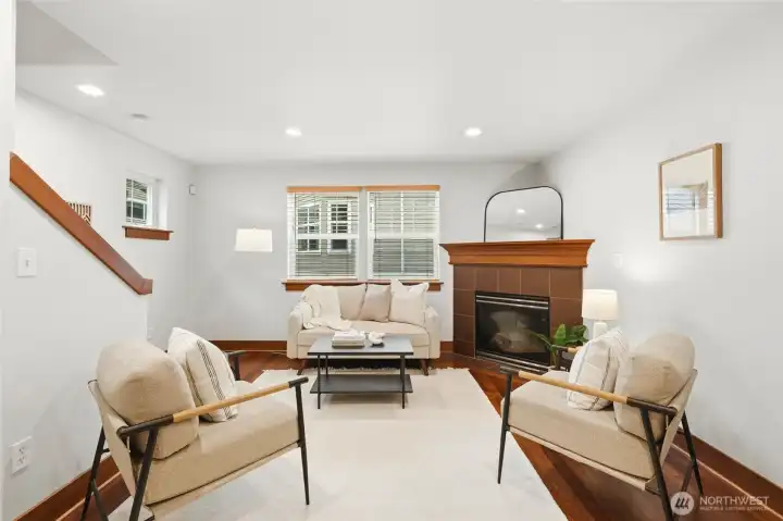 Living room features a gas fireplace which creates a cozy environment during colder weather