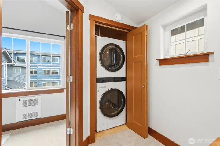 Stackable LG washer & dryer stay with buyer