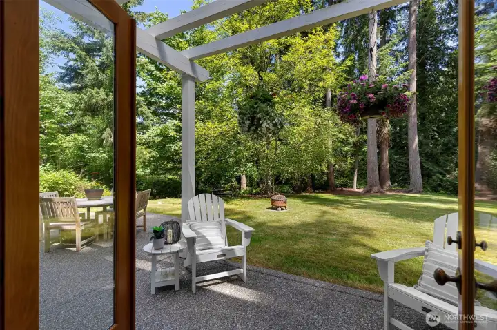 Dining room french doors lead to the outside.